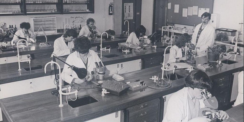 vintage shot of people learning in a science lab